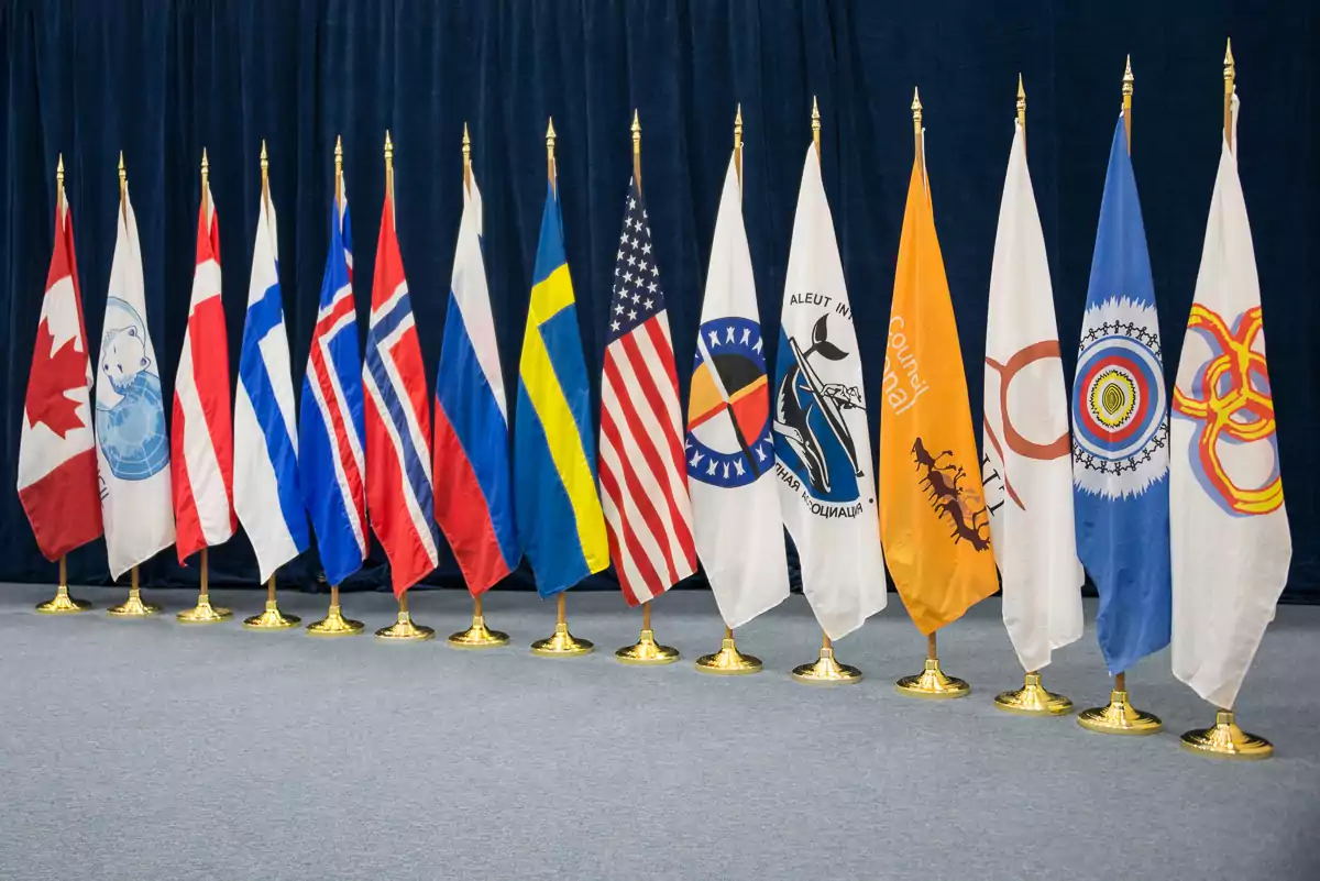 /articles/balancing-competition-space-diplomacy/arctic-council-flags-2.webp